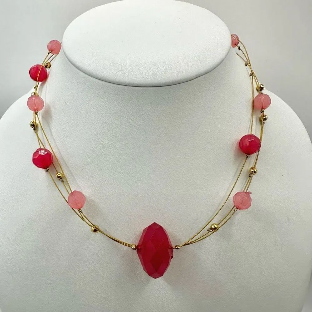 Pink and gold tone wire floating bead necklace